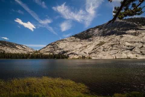 Merced Lake itself, ringed by glacially polished granite. The camp sits near its outlet.