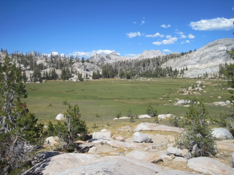 Long Meadow spreading out below camp, ringed by granite domes and spires.